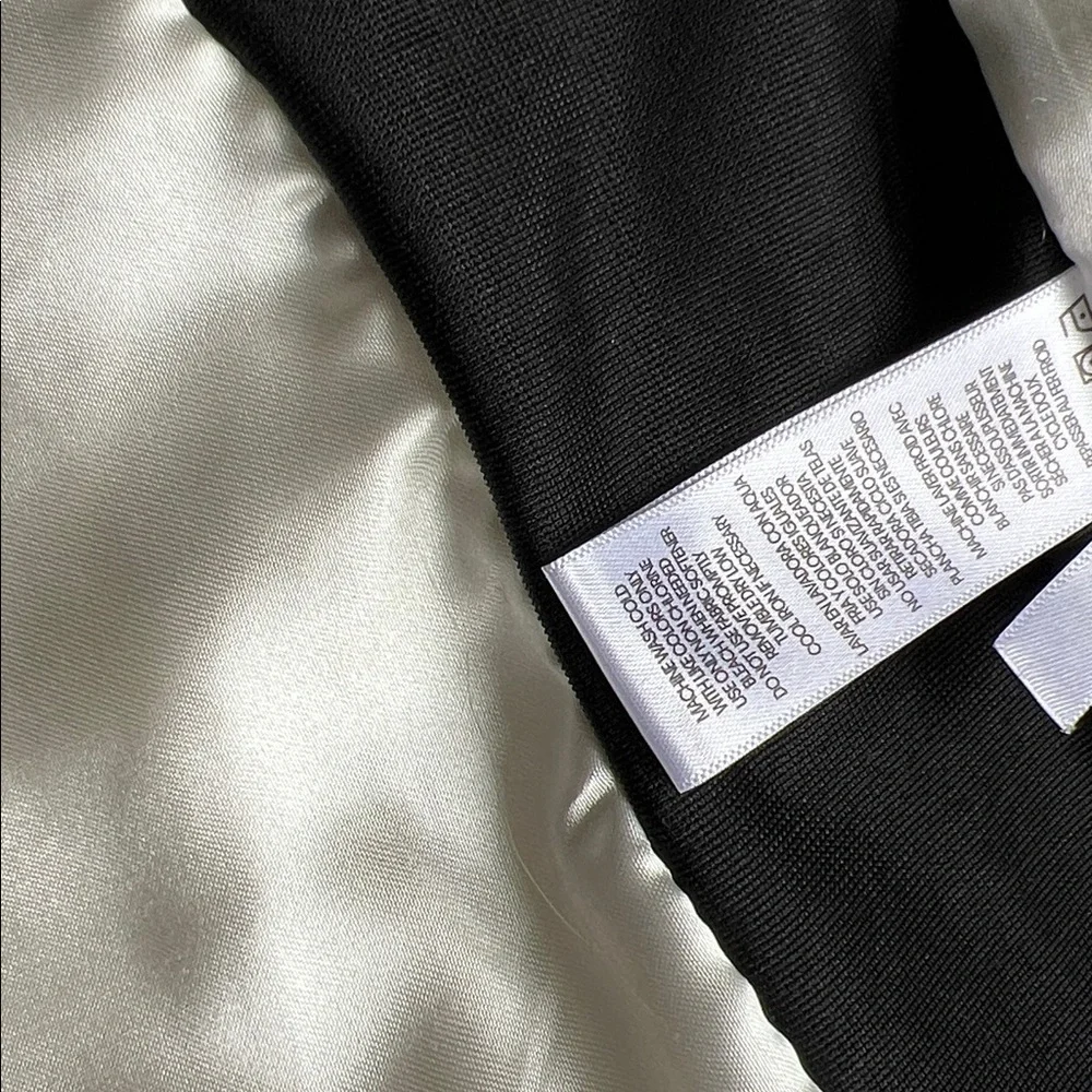 Cream and black quilted fitted vest by Calvin Klein with ribbed knit details sm - Picture 9 of 11